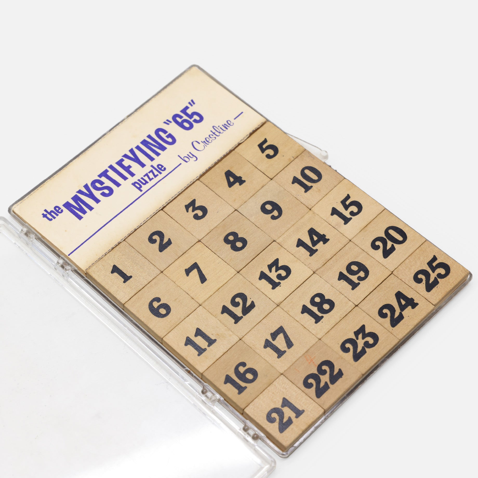 VINTAGE MISCELLANEOUS “THE MYSTIFYING 65 PUZZLE” WOODEN TOY(CRESTLINE)