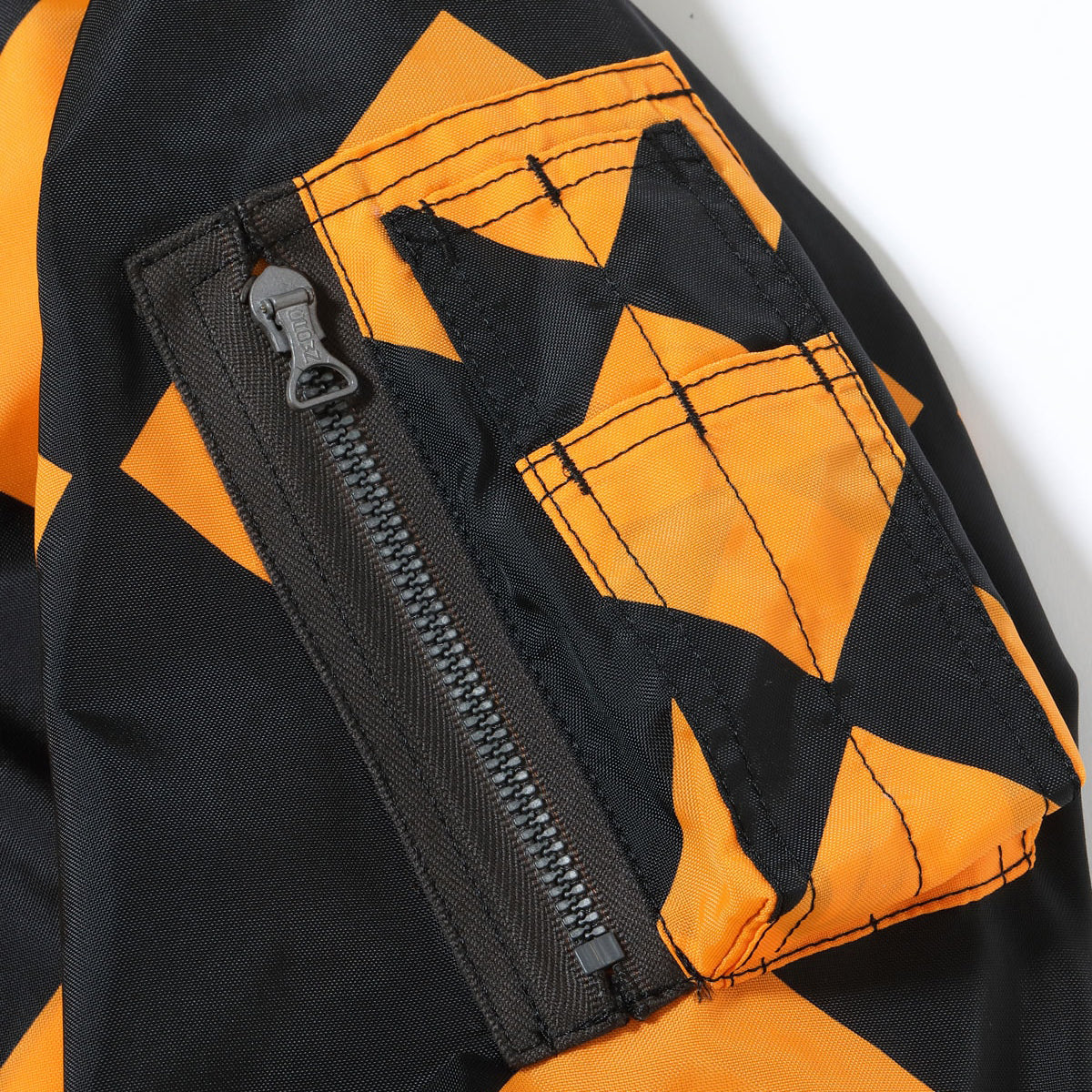 TYPE G-1 “BUZZ RICKSON MFG. CO.” （ORANGE × BLACK）